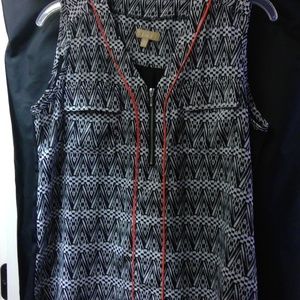 black and white with orange piping